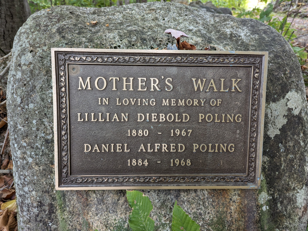 Plaque at the entrance of cemetery